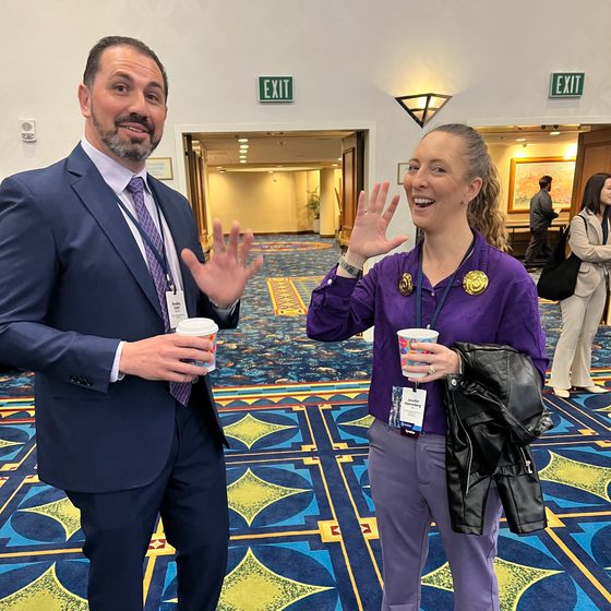 CSA members and exhibitors networking at a meeting
