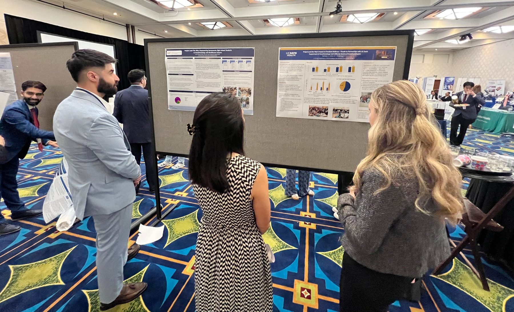 Attendees reviewing posters at the CSA Poster Session