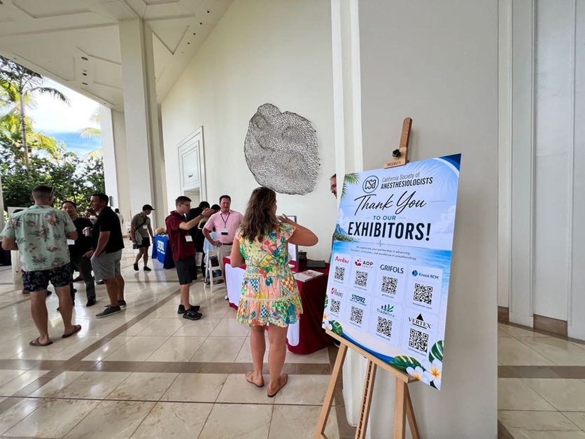 A CSA sign thanking exhibitors, listing their logos