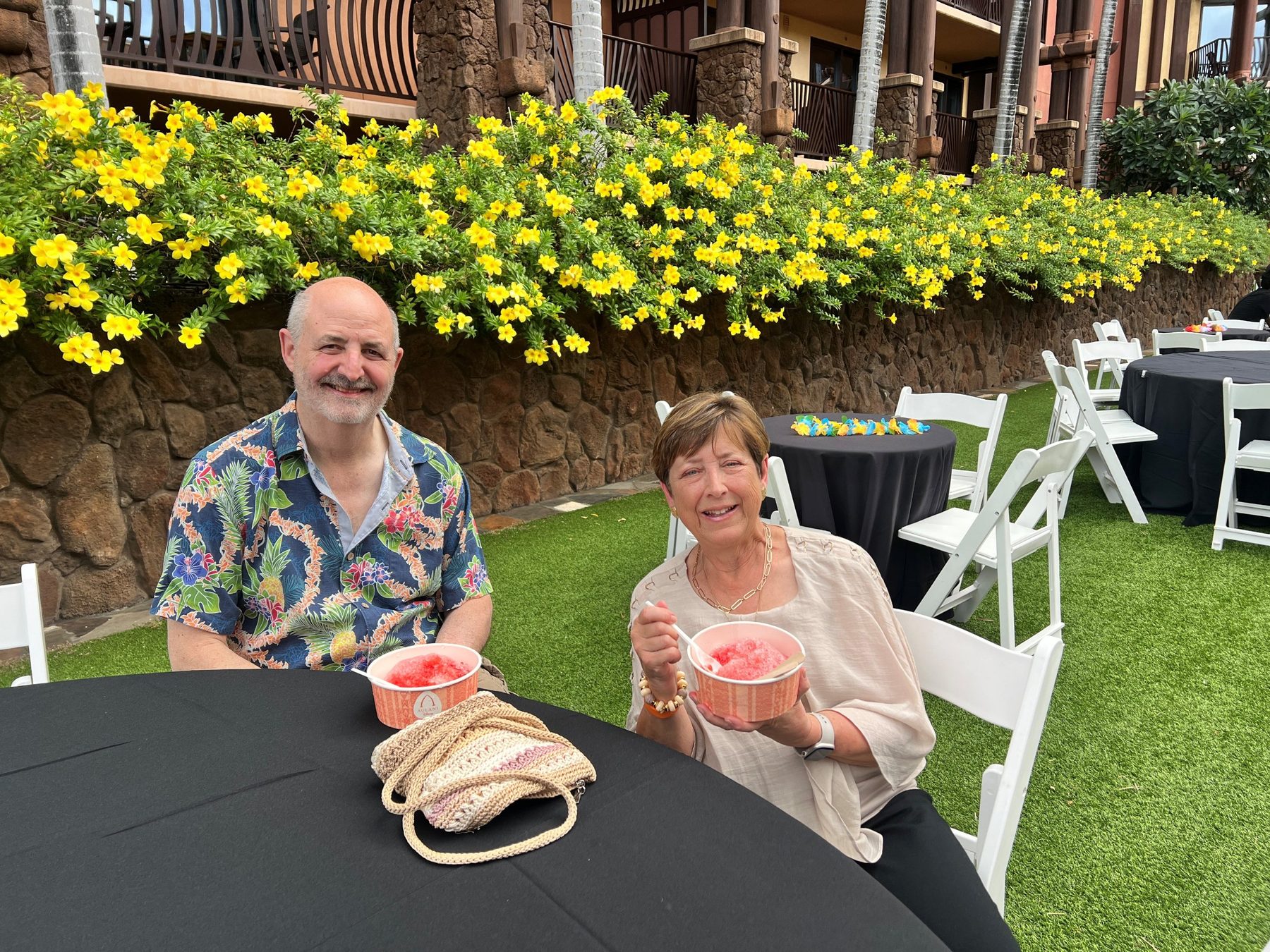Attendees enjoying shave ice on the lawn at the Hawaii anesthesia conference